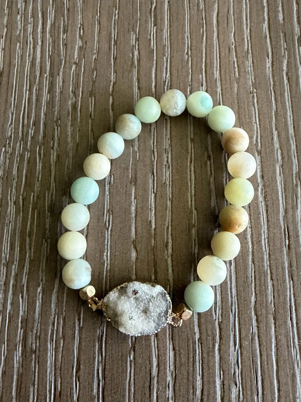 Handcrafted Mint Beaded Bracelet Stack with Crystal and Medallion LV bag.